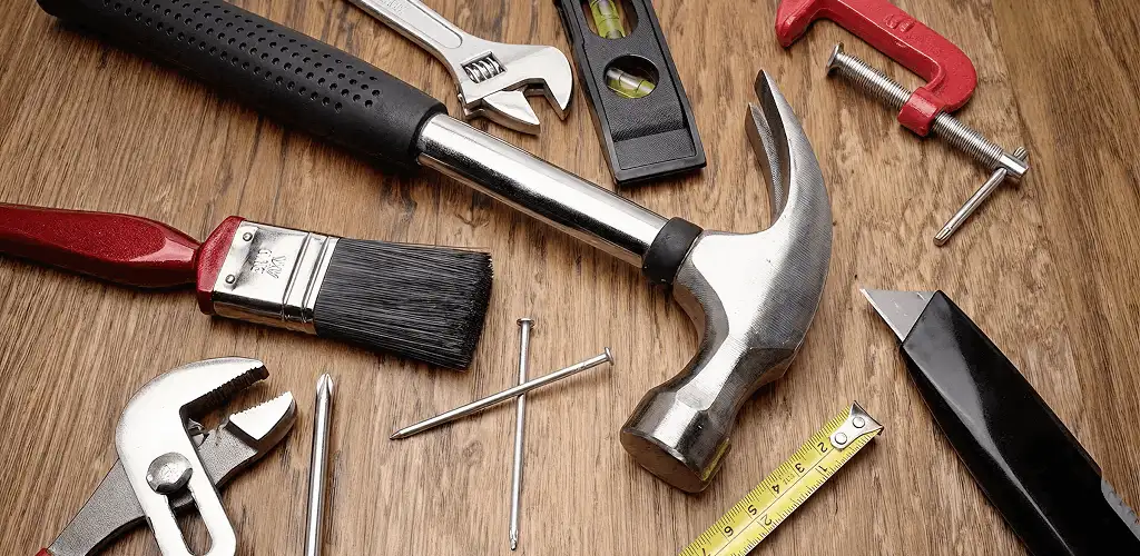 Handyman tools laid out for home repair and maintenance work in Huntsville, AL